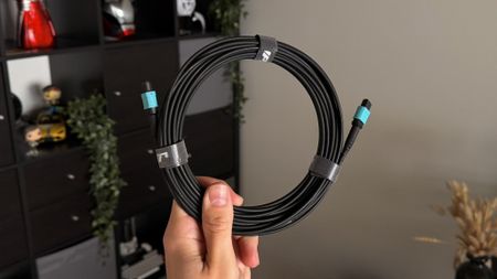 Ruipro Fiber HDMI Cable held in a hand