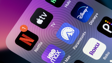 Streaming apps on a smartphone screen with 金刚生态TechRadar radar overlay